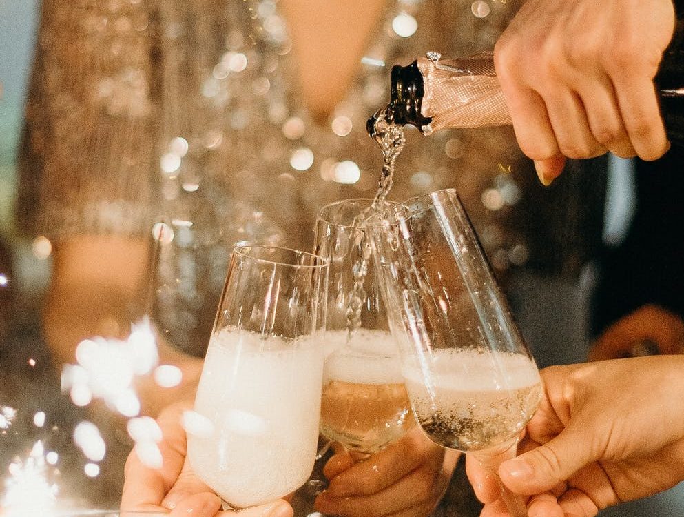 toasting with champagne on New Year's Eve