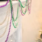 Mardi Gras beads on mantle