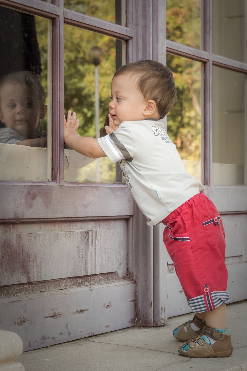 toddler with mirror, "Reflections"